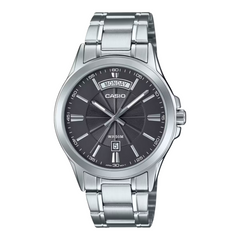 Casio watch with silver metal strap and dark face on a white background